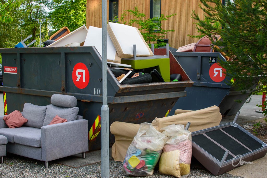 Trash containers outside student housing at the end of academic year, Trondheim