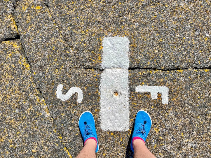 Standing on border line with feet in Finland and Sweden